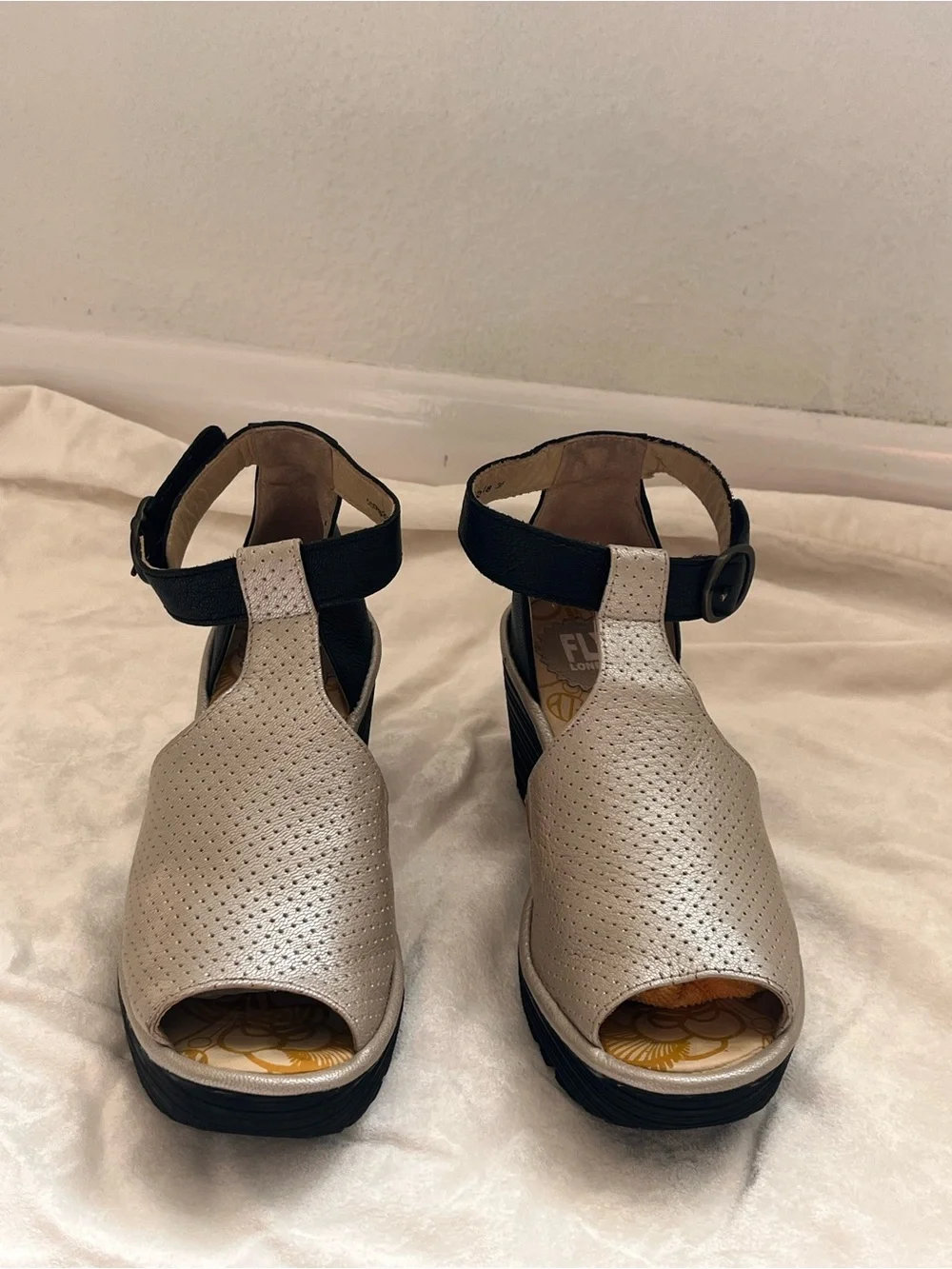 Fly London Metallic Gold $240 Perforated Wedge Sandals with Black Ankle Strap